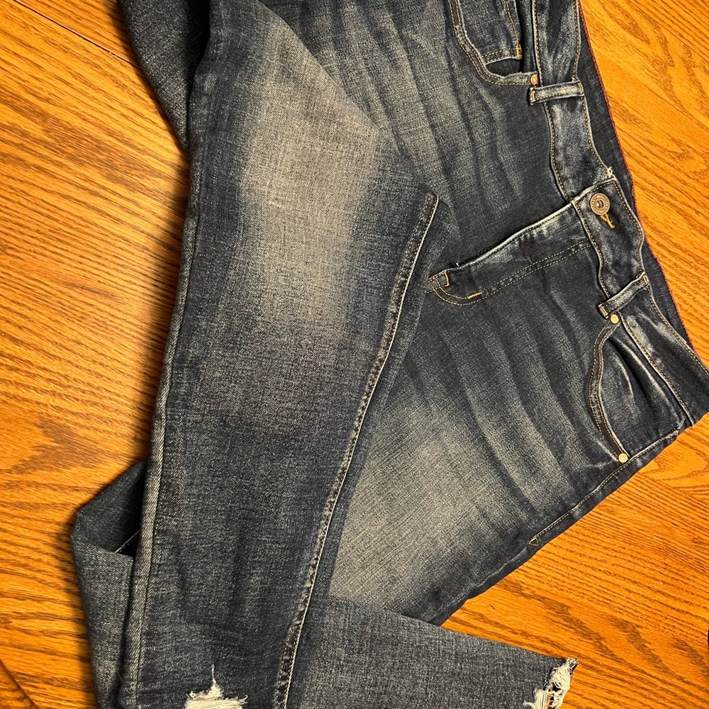 Women’s Maurices skinny jeans with “ripped” ankle skinny jeans.